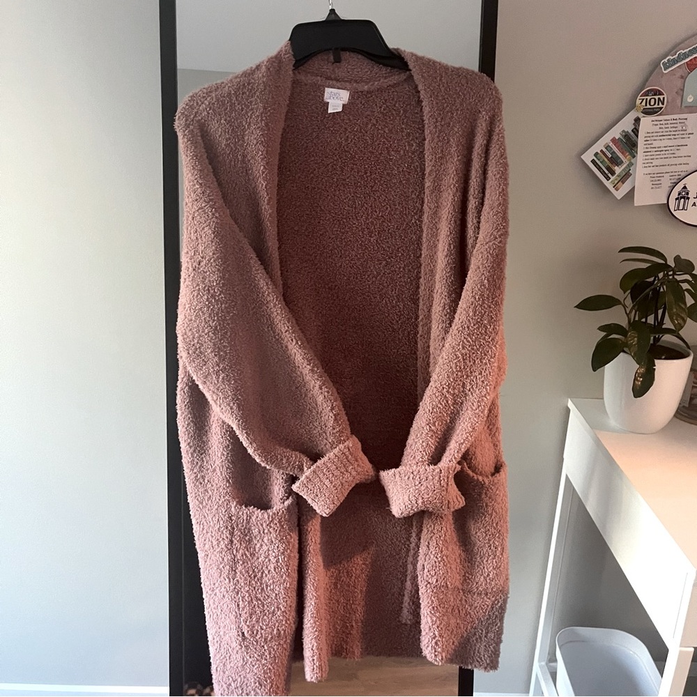 Fuzzy pink stars above robe cardigan